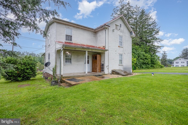 320 E Front St, Lewisberry, PA 17339 - view of front of property with a front lawn and a patio area