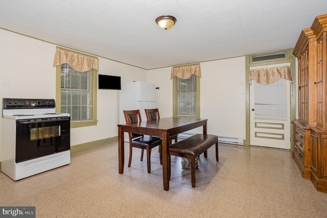 320 E Front St, Lewisberry, PA 17339 - dining area with a baseboard radiator, light flooring, and baseboards