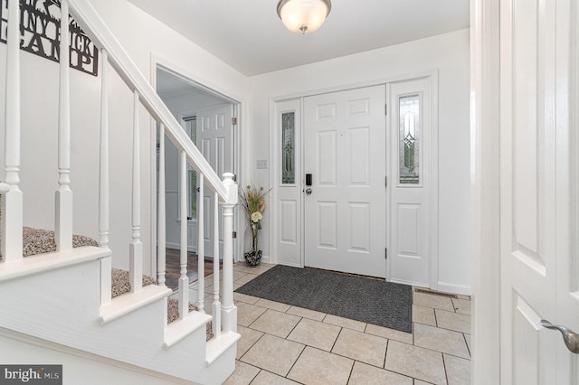 1070 George Brown Rd, Millerstown, PA 17062 - entrance foyer featuring stairway, light tile patterned floors, and baseboards