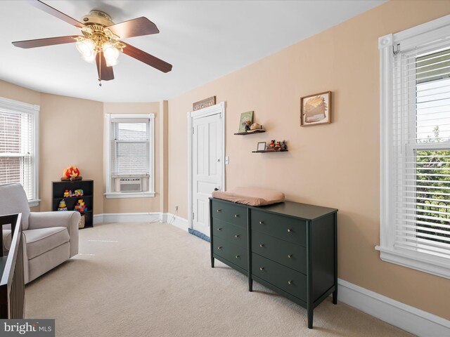 1503 W Tenth St, Wilmington, DE 19806 - sitting room featuring light colored carpet, a ceiling fan, baseboards, and cooling unit