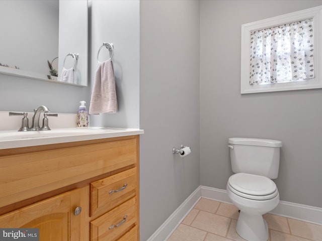 1503 W Tenth St, Wilmington, DE 19806 - bathroom featuring toilet, baseboards, vanity, and tile patterned flooring