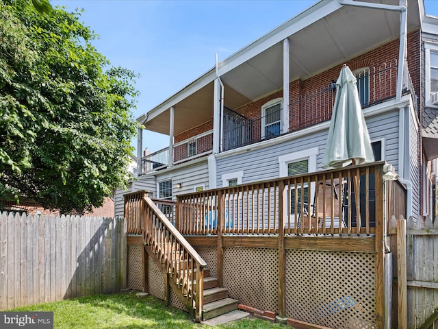 1503 W Tenth St, Wilmington, DE 19806 - back of house featuring stairs, brick siding, and a deck