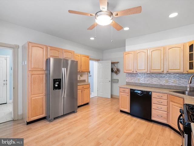 1503 W Tenth St, Wilmington, DE 19806 - kitchen with stainless steel appliances, light brown cabinets, a sink, tasteful backsplash, and recessed lighting