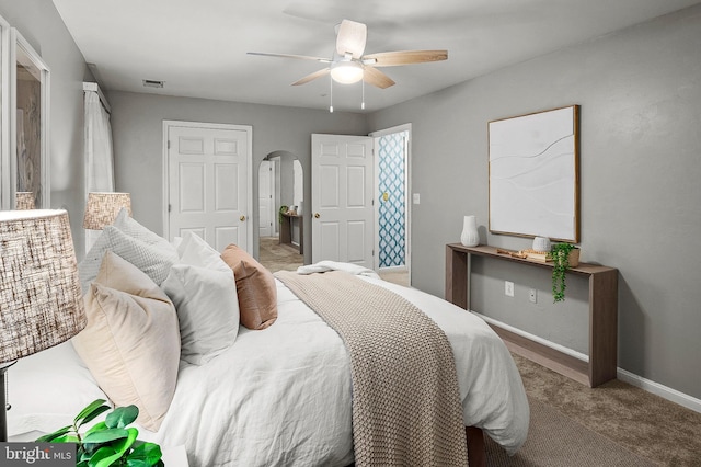 2021 Rudy Serra Dr Unit 1D, Eldersburg, MD 21784 - bedroom featuring arched walkways, baseboards, carpet floors, and ceiling fan