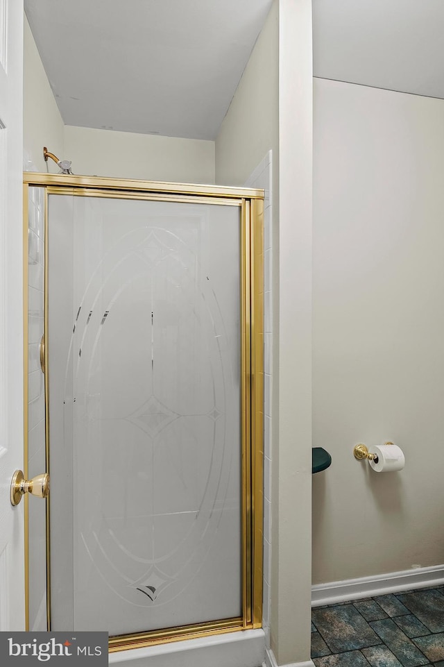 2021 Rudy Serra Dr Unit 1D, Eldersburg, MD 21784 - full bathroom featuring a shower stall and baseboards