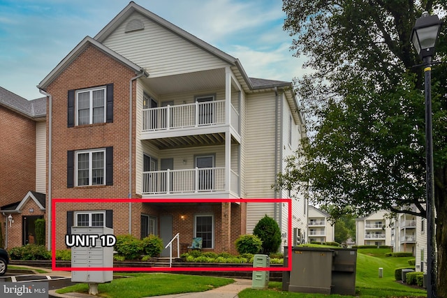 2021 Rudy Serra Dr Unit 1D, Eldersburg, MD 21784 - view of front of property with brick siding and a front yard