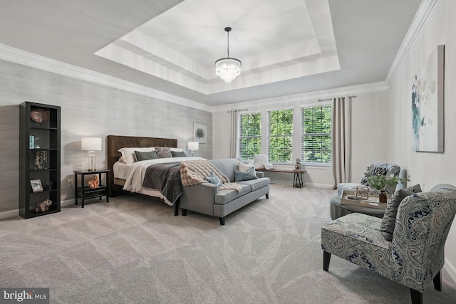 bedroom with carpet floors, a chandelier, a raised ceiling, baseboards, and ornamental molding