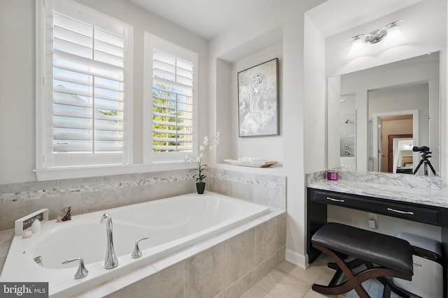 bathroom featuring a bath and tile patterned floors