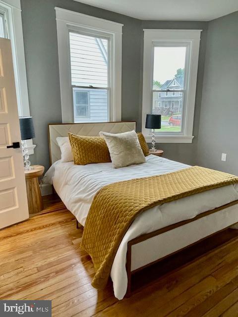 25 Elmont Ave, Baltimore, MD 21206 - bedroom featuring light wood-type flooring