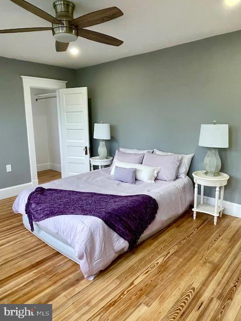 25 Elmont Ave, Baltimore, MD 21206 - bedroom with baseboards, wood finished floors, and ceiling fan