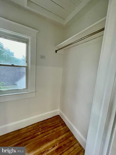 25 Elmont Ave, Baltimore, MD 21206 - walk in closet featuring dark wood finished floors
