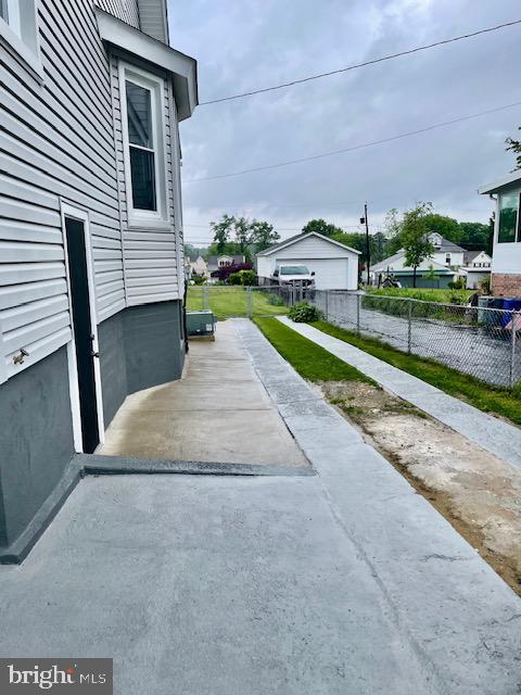25 Elmont Ave, Baltimore, MD 21206 - view of patio featuring fence