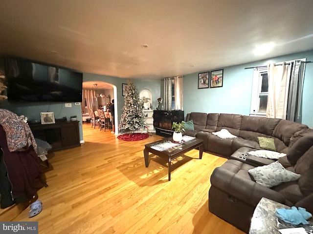 2257 Disston St, Philadelphia, PA 19149 - living area featuring arched walkways and wood finished floors