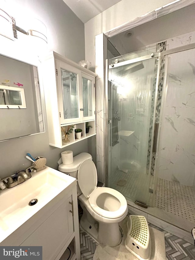 2257 Disston St, Philadelphia, PA 19149 - full bathroom with a marble finish shower, toilet, and vanity