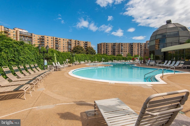 community pool featuring a patio
