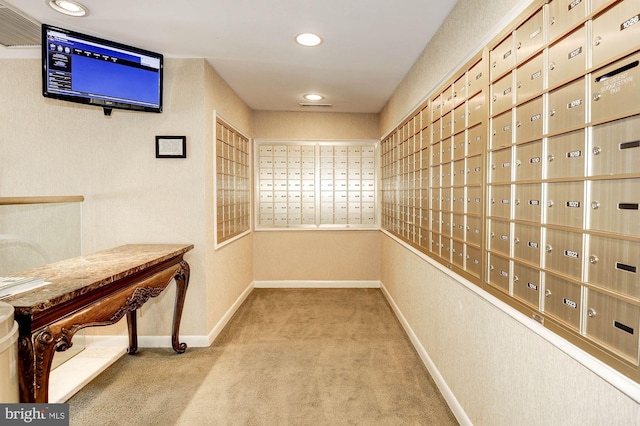 view of community with mail area and recessed lighting