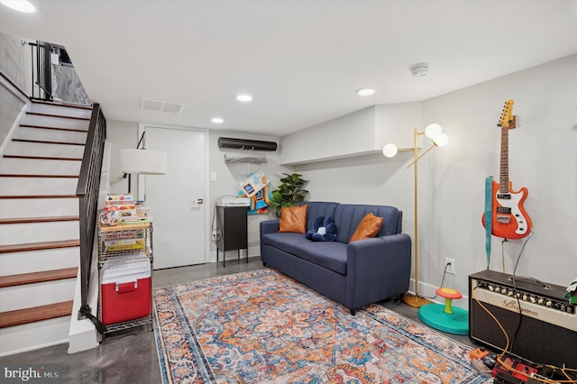 1322 N Hollywood St, Philadelphia, PA 19121 - living area featuring stairs, finished concrete floors, and recessed lighting