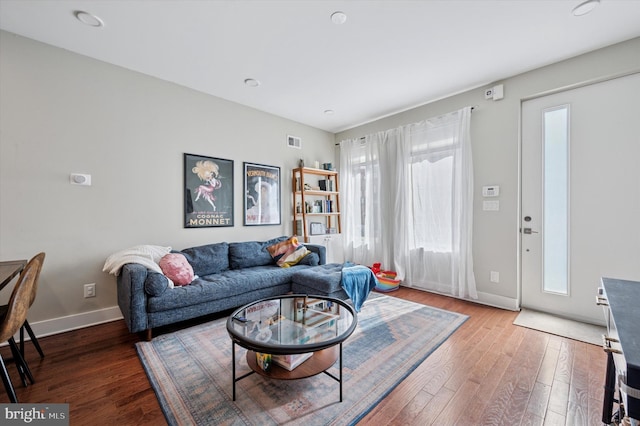 1322 N Hollywood St, Philadelphia, PA 19121 - living room featuring wood finished floors and baseboards
