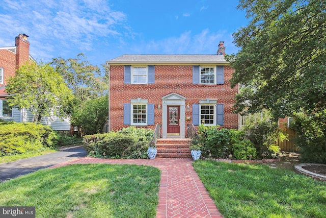 3122 1st St N, Arlington, VA 22201 - colonial house with brick siding and a chimney