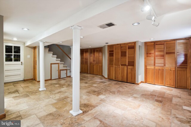 3122 1st St N, Arlington, VA 22201 - finished below grade area with stone tile floors, stairs, baseboards, and recessed lighting