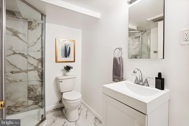 3122 1st St N, Arlington, VA 22201 - full bathroom with marble finish floors, a marble finish shower, toilet, vanity, and baseboards