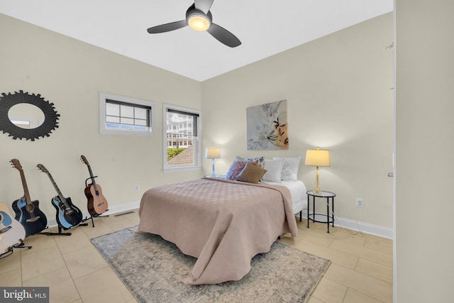 202 Muir St Unit 202, Cambridge, MD 21613 - bedroom featuring tile patterned flooring, baseboards, and a ceiling fan