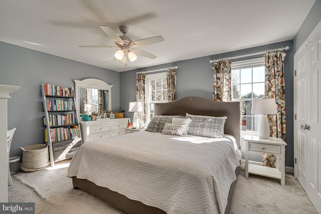 15656 Cliff Swallow Way, Rockville, MD 20853 - bedroom with a closet, carpet, and ceiling fan