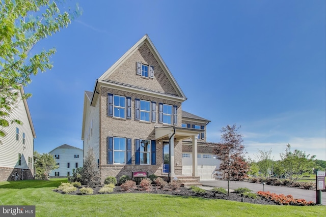 6501 Clubhouse Dr, Laurel, MD 20708 - view of front of property with brick siding, a front lawn, and a garage