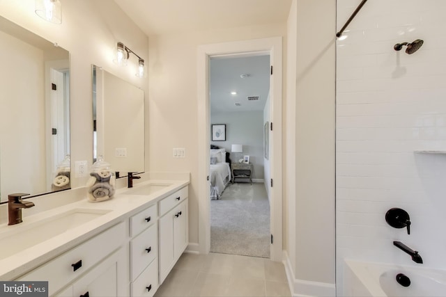 6501 Clubhouse Dr, Laurel, MD 20708 - ensuite bathroom with double vanity, shower / washtub combination, tile patterned floors, and baseboards