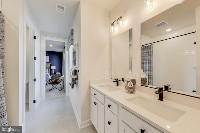 6501 Clubhouse Dr, Laurel, MD 20708 - ensuite bathroom featuring double vanity, a shower with curtain, baseboards, and recessed lighting