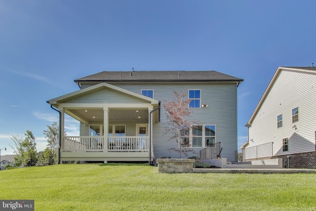 6501 Clubhouse Dr, Laurel, MD 20708 - back of house with a yard and covered porch