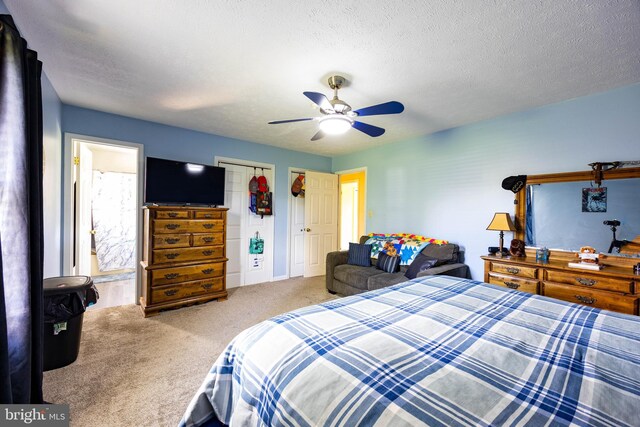 189 Columbia Dr, Kearneysville, WV 25430 - bedroom featuring carpet, ceiling fan, a textured ceiling, and ensuite bathroom