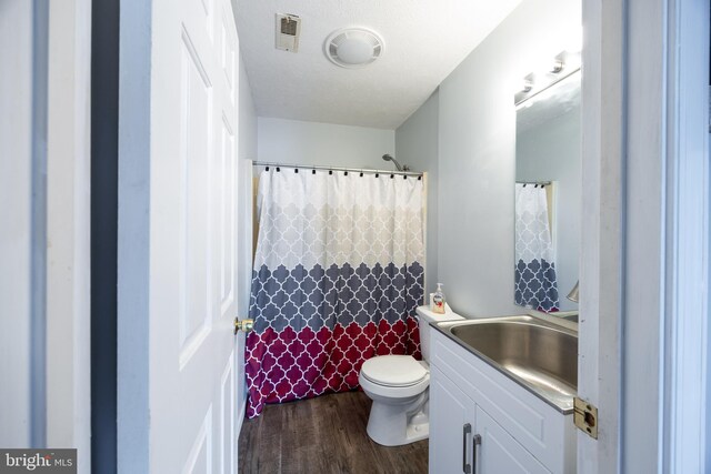 189 Columbia Dr, Kearneysville, WV 25430 - full bath with vanity, wood finished floors, and toilet