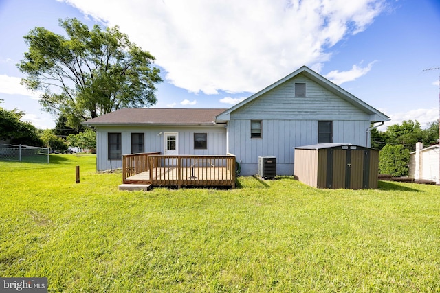 189 Columbia Dr, Kearneysville, WV 25430 - back of house featuring a deck, cooling unit, and a yard