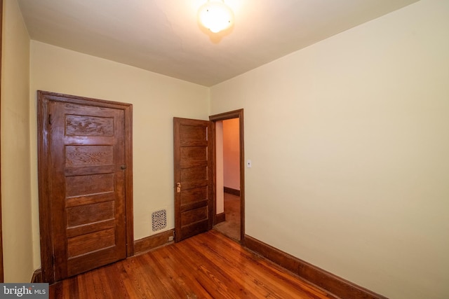 3632 Midvale Ave, Philadelphia, PA 19129 - unfurnished bedroom featuring wood finished floors and baseboards