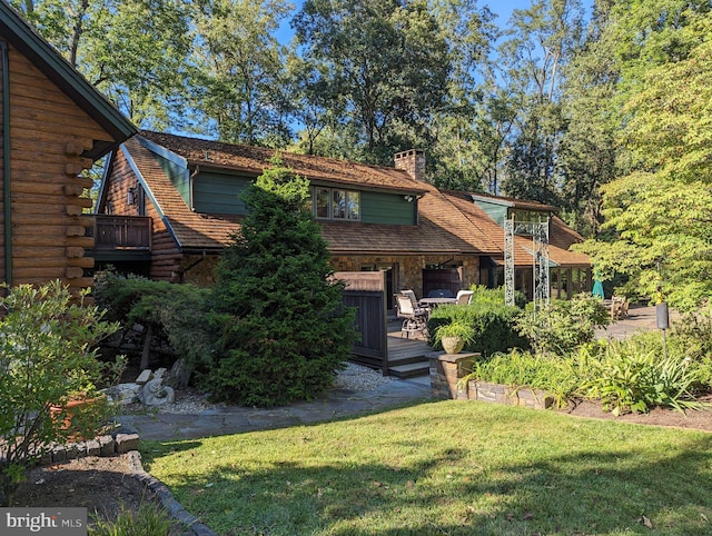 6030 Lower Mountain Rd, New Hope, PA 18938 - back of house with a lawn, a chimney, and a wooden deck