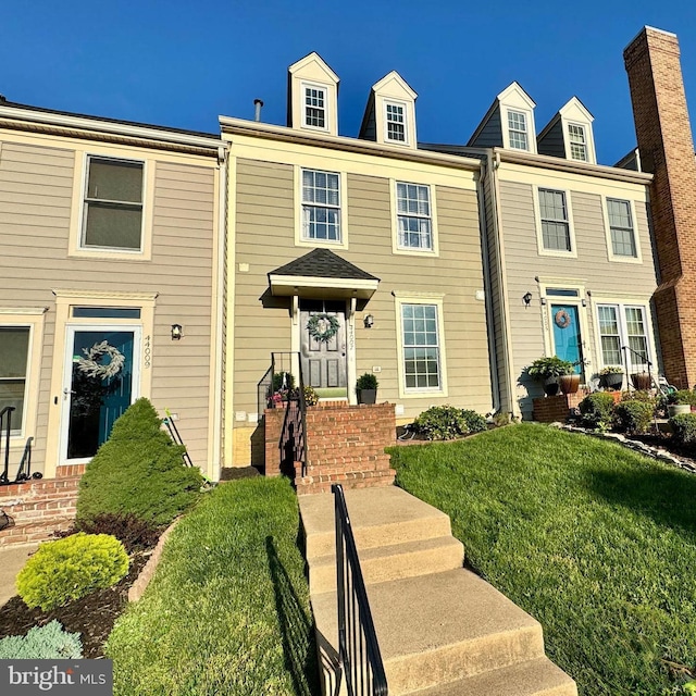 44007 Kitts Hill Ter, Ashburn, VA 20147 - townhome / multi-family property featuring a front yard