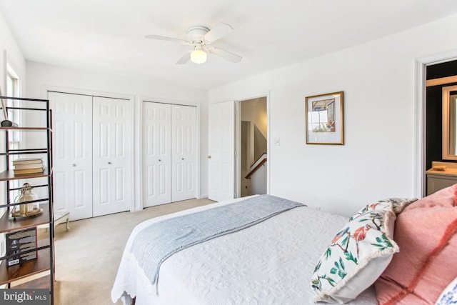 44007 Kitts Hill Ter, Ashburn, VA 20147 - bedroom featuring two closets, carpet, and a ceiling fan