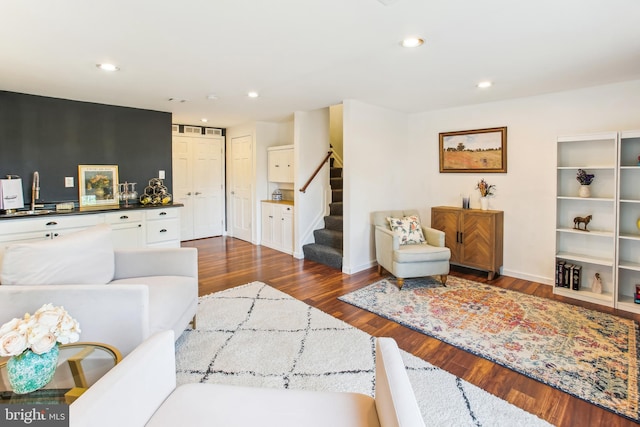 44007 Kitts Hill Ter, Ashburn, VA 20147 - living room featuring stairway, dark wood-type flooring, and recessed lighting