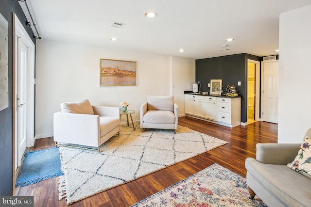 44007 Kitts Hill Ter, Ashburn, VA 20147 - living room featuring dark wood finished floors and recessed lighting