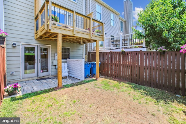 44007 Kitts Hill Ter, Ashburn, VA 20147 - back of house with a fenced backyard and a patio area