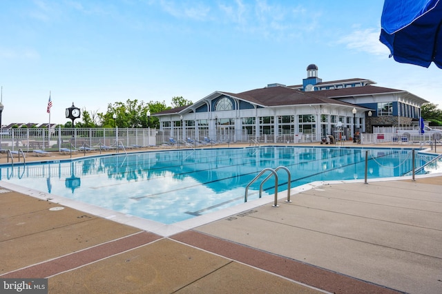 44007 Kitts Hill Ter, Ashburn, VA 20147 - community pool with a patio