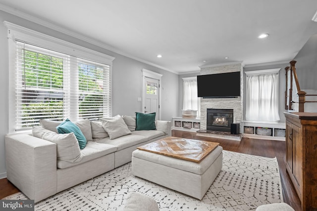 614 Maple Ave, Haddonfield, NJ 08033 - living area featuring plenty of natural light, ornamental molding, wood finished floors, a fireplace, and recessed lighting