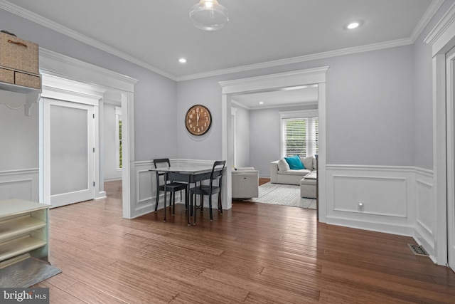 614 Maple Ave, Haddonfield, NJ 08033 - dining space with wood finished floors, a wainscoted wall, a decorative wall, crown molding, and recessed lighting