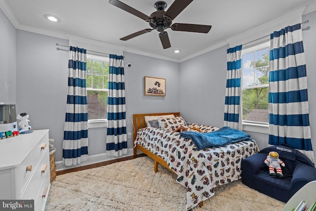 614 Maple Ave, Haddonfield, NJ 08033 - bedroom with multiple windows, crown molding, recessed lighting, wood finished floors, and baseboards