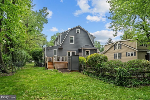 614 Maple Ave, Haddonfield, NJ 08033 - back of property with a wooden deck and a gambrel roof