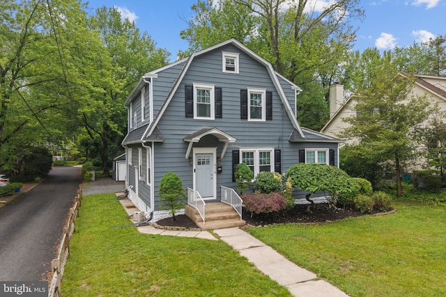 614 Maple Ave, Haddonfield, NJ 08033 - dutch colonial with a gambrel roof and a front lawn
