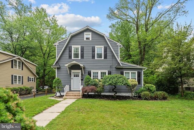 614 Maple Ave, Haddonfield, NJ 08033 - dutch colonial featuring a front yard and a gambrel roof