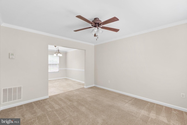 7481 Windswept Ct, Sykesville, MD 21784 - carpeted empty room featuring ornamental molding, a ceiling fan, and a chandelier