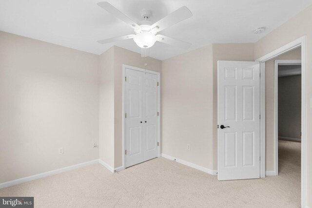 7481 Windswept Ct, Sykesville, MD 21784 - unfurnished bedroom featuring carpet and a ceiling fan